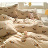 A set of beige duvet cover and pillowcases featuring a cute dog print pattern.