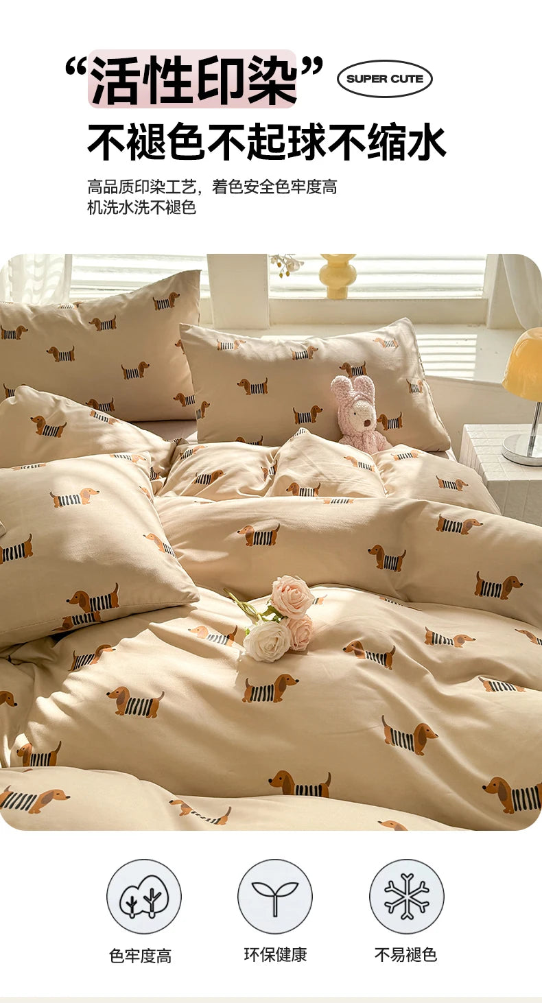 A set of beige duvet cover and pillowcases featuring a cute dog print pattern.