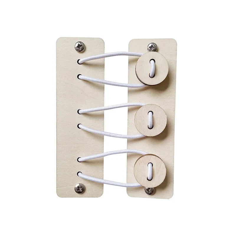 A wooden Montessori busy board with three circular holes and white cord loops for learning activities.
