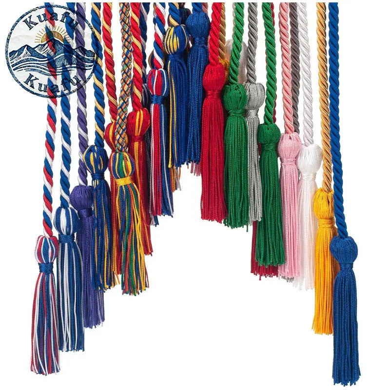 A collection of colorful graduation honor cords with tassels hanging vertically.