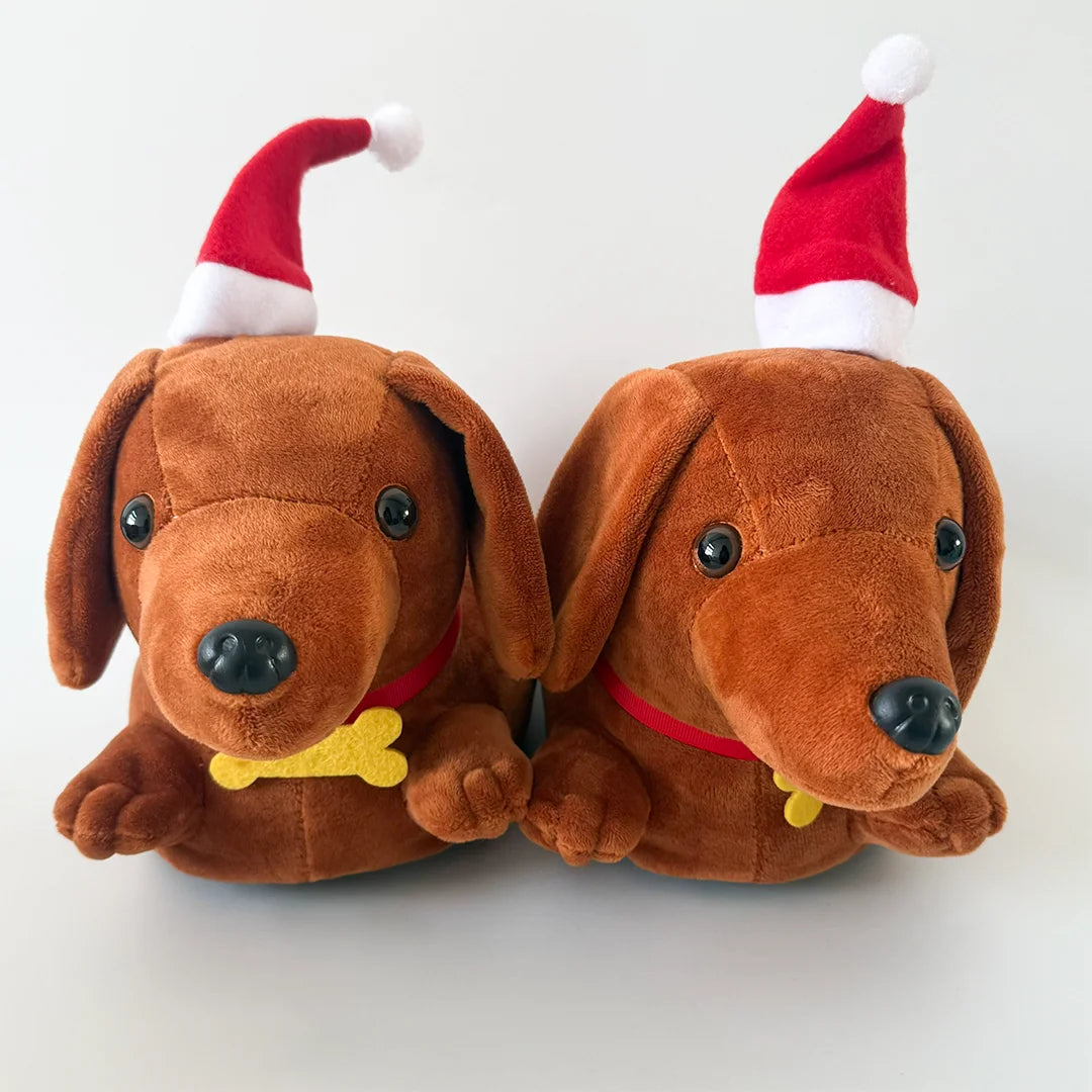 A pair of brown dachshund plush slippers with red and white Santa hats.
