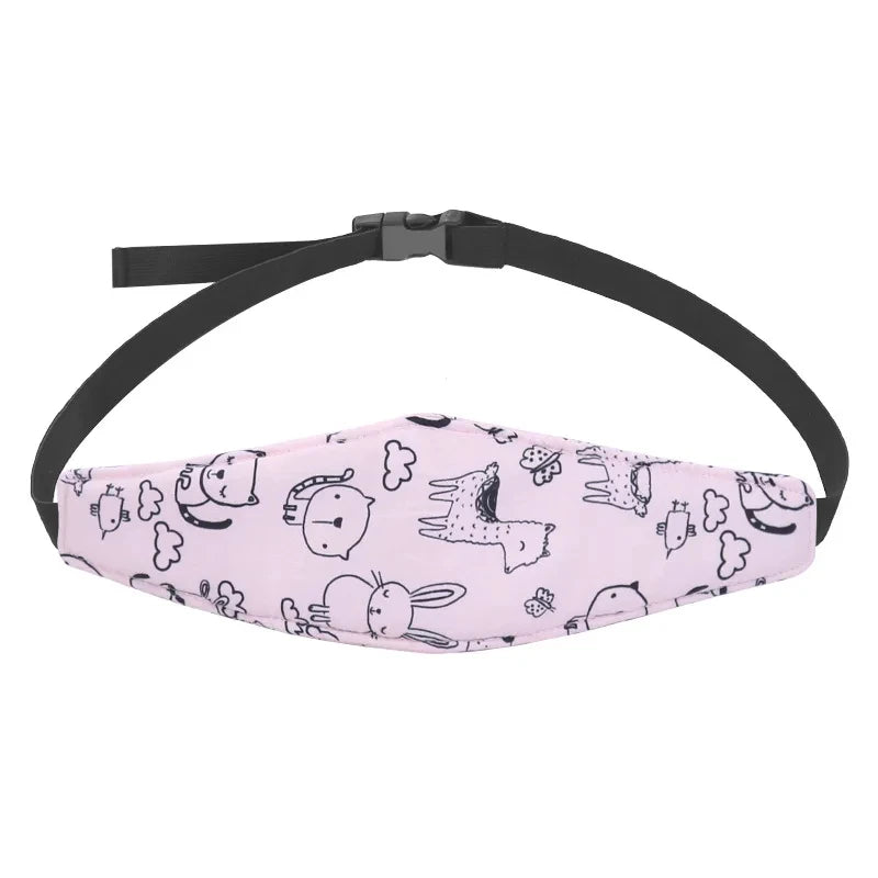 Pink patterned baby car seat sleeping headrest with a black adjustable belt strap