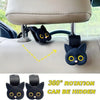 A set of two black cat-shaped headrest hooks with yellow eyes, designed for car seats.