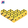 A set of ten yellow plastic game dice with black dots, arranged in a cluster.