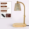 A gold-toned floor lamp with a clear glass shade and wooden base, featuring a 35W LED bulb.