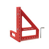 A red drawing line ruler with a triangular angle and a straight edge, marked in inches and centimeters.
