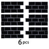 A set of six black 3D waterproof peel-and-stick kitchen wall tiles arranged in a grid.