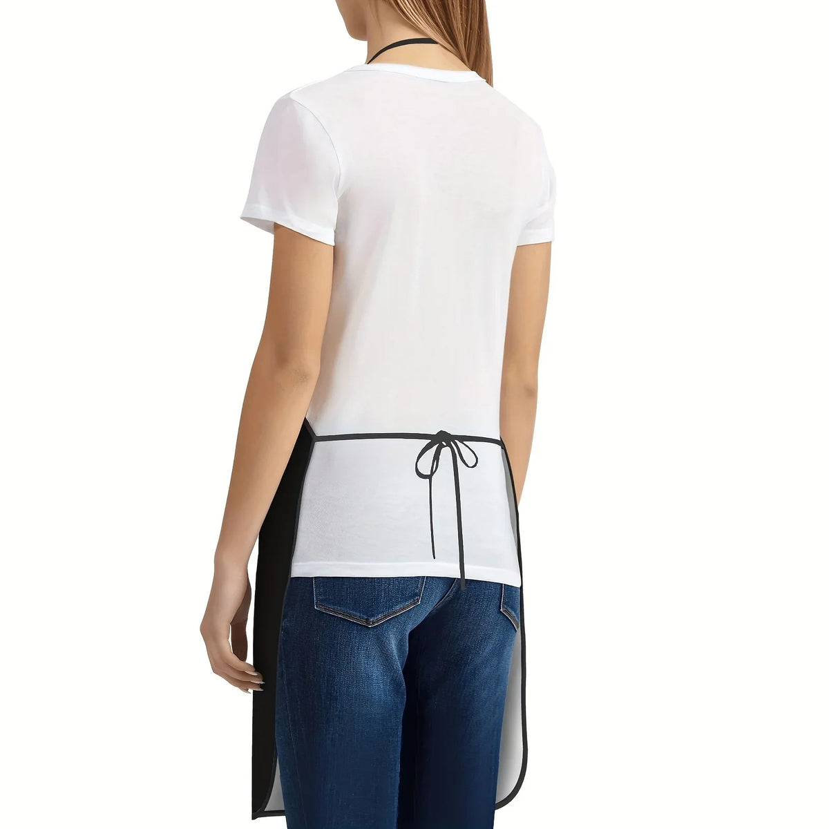 A white t-shirt worn under a black adjustable apron with black ties.