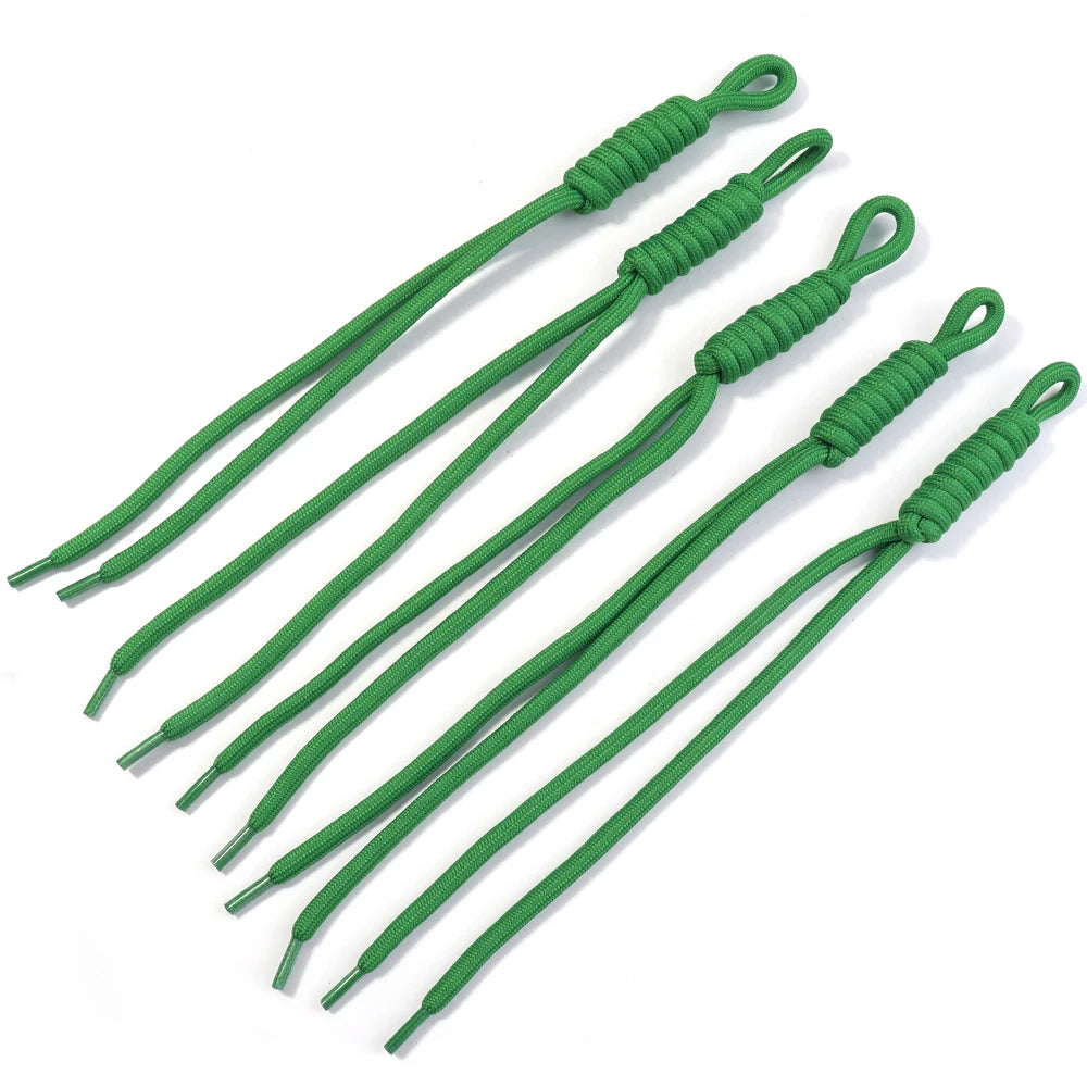 Green braided nylon lanyards with metal clasps arranged diagonally