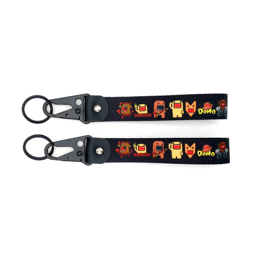 Black keychain featuring a JDM style anime girl character with a steel clip.