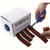 A hand is using a blue tool to remove sandpaper rolls from a box labeled Multi Abrasive Rolls Pack.