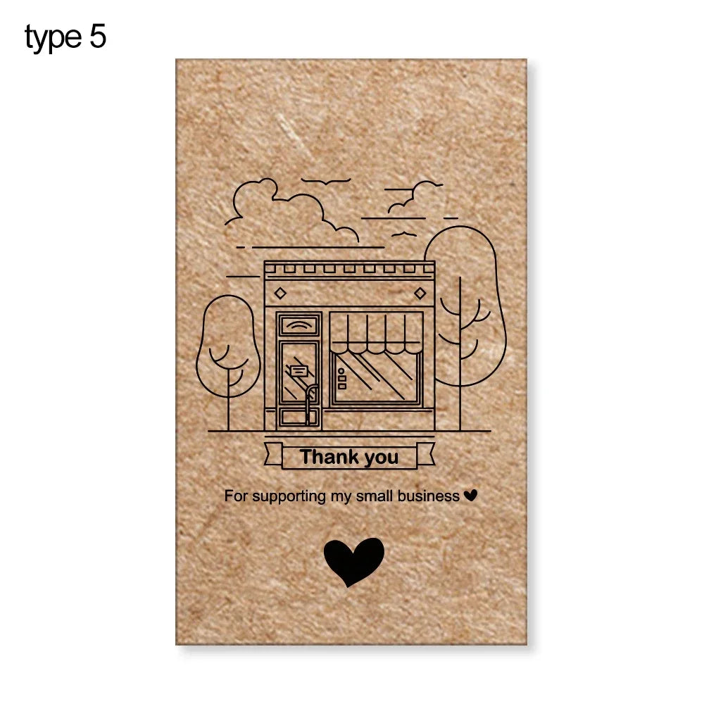 A brown kraft paper tag featuring a line drawing of a storefront and the text Thank you for supporting my small business.