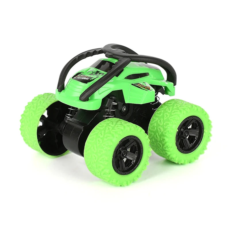 A bright green off-road stunt car with large tires and a black chassis.