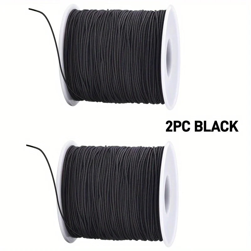 Two black spools of stretchy elastic cord for jewelry making