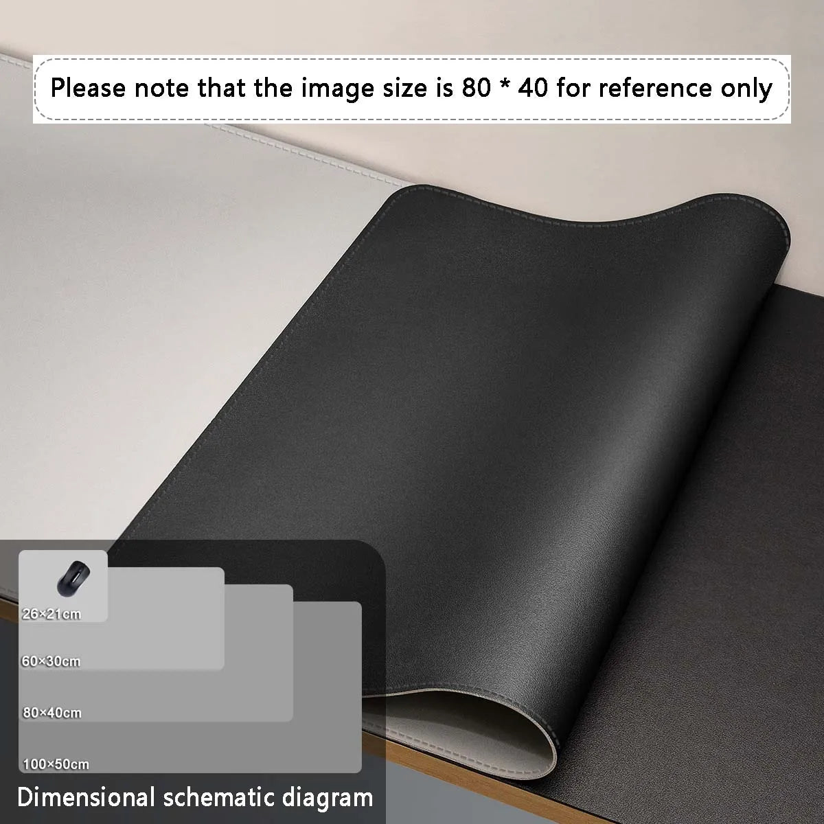 A black premium PU leather desk mat shown in a rolled or folded state on a light surface.