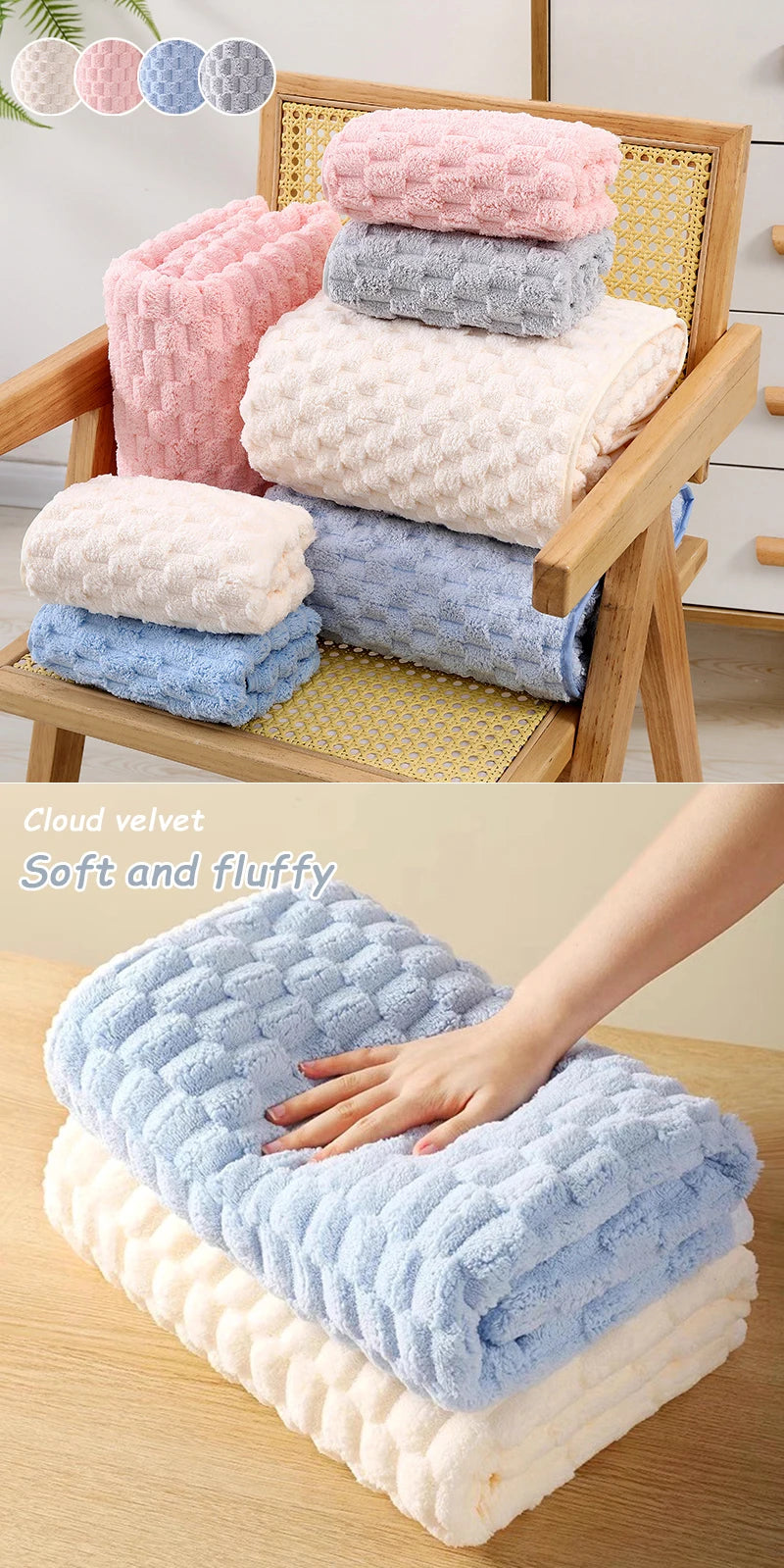 A stack of various colored cloud velvet bath towels, including pink, light blue, and white, are displayed on a wooden rack.