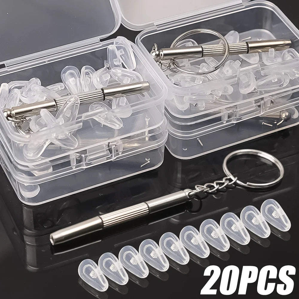 A set of soft silicone air chamber nose pads with mini screwdrivers for glasses repair, packaged in clear plastic containers.