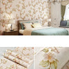Roll of 3D embossed floral self-adhesive wallpaper featuring delicate pink and green botanical designs.