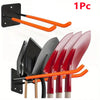 A heavy-duty garage storage hook with black brackets and orange handles for hanging garden tools.