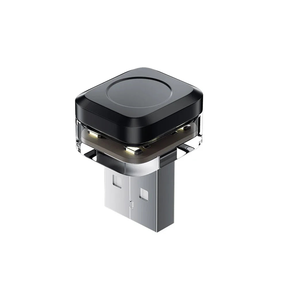 A compact LED car ambient light featuring a black housing and a silver base.