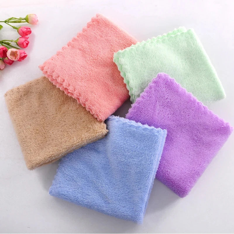 A set of ten ultra-soft velvet face towels in various pastel colors including coral pink, mint green, beige, and lavender.