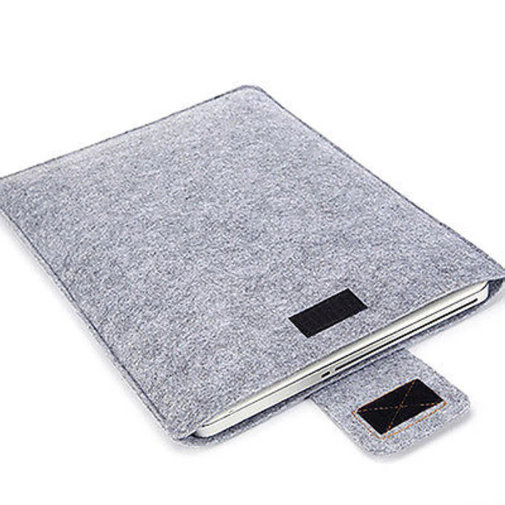 A gray felt laptop sleeve case for a 11 to 15 inch device, shown open.