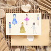 A set of princess costume puzzle stickers featuring various stylized female figures in colorful dresses and outfits.