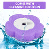 Purple disposable toilet brush kit with a wall-mounted holder and cleaning solution being used in water.