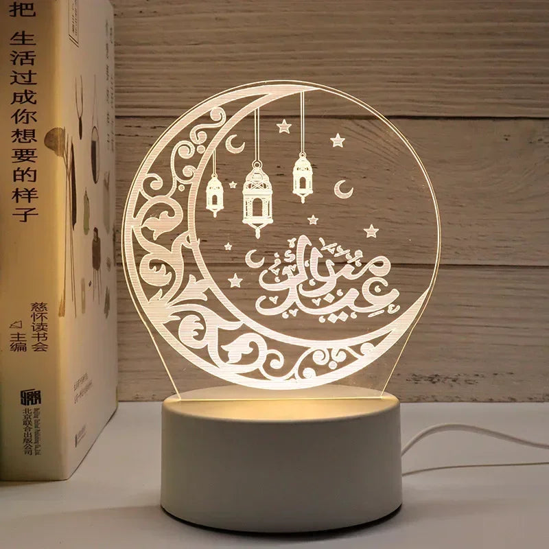 A glowing moon design acrylic night light featuring Arabic calligraphy and stars, powered by a USB cable.