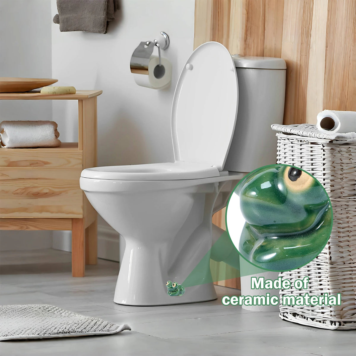 A white ceramic toilet with a green frog bolt cover mounted on the wall next to wooden shelving.