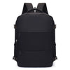 A black compact cabin travel backpack with padded straps and external pockets.