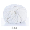 A ball of white chunky acrylic yarn used for knitting and crochet