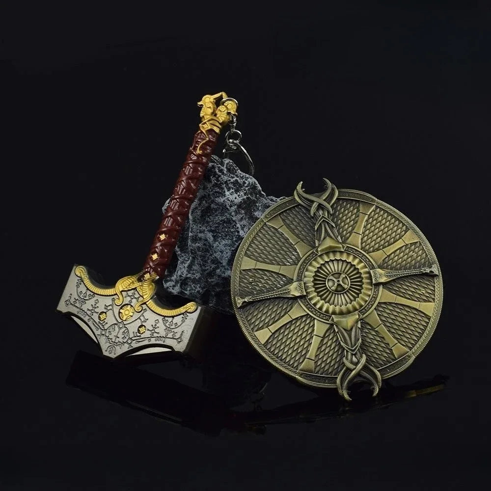 A detailed metal sword keychain featuring a reddish hilt and a circular ornament with intricate patterns.