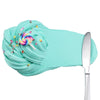 A light turquoise slime kit with a colorful swirl and small confetti scattered on the surface.