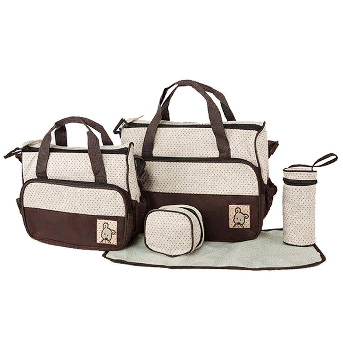 A set of brown and cream multifunctional crossbody diaper bags for parents.