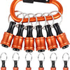 A set of magnetic hex bit holders with quick-release chucks in copper and black, packaged as a keychain.