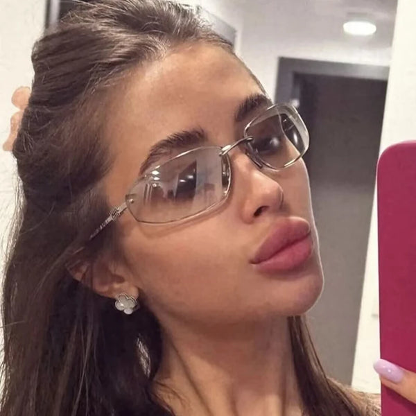 Gafas de sol sin montura ovaladas con lentes degradados