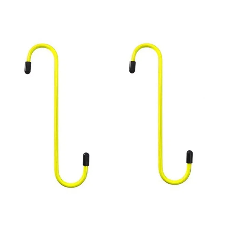 Yellow S-hook brake caliper hanger for auto repair