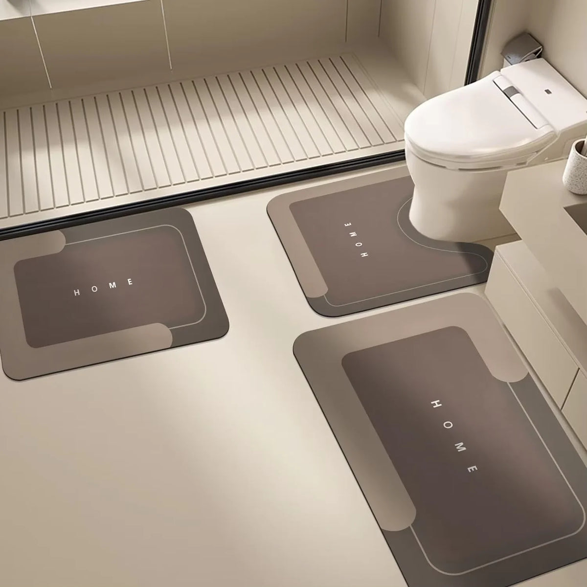 A modern bathroom featuring a toilet and floor mats for natural diatomium mud protection.