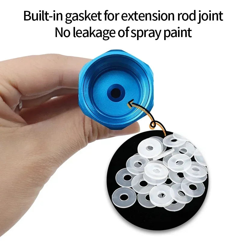A hand holds a blue paint sprayer extension rod with a gasket and a circular disc of silicone seals.