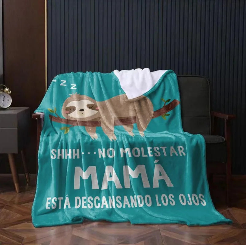 Türkisgestrickter Überwurf mit Sloth-Design und spanischer Nachricht: 'SHHH NICHT STÄRRE MAMA ERHILTET VORSORGE