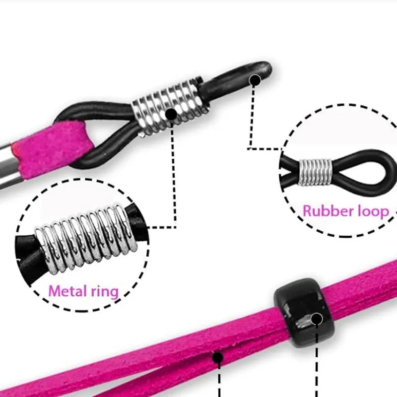 Close-up view of an adjustable soft eyewear lanyard featuring a metal ring and rubber loop attached to a pink strap.