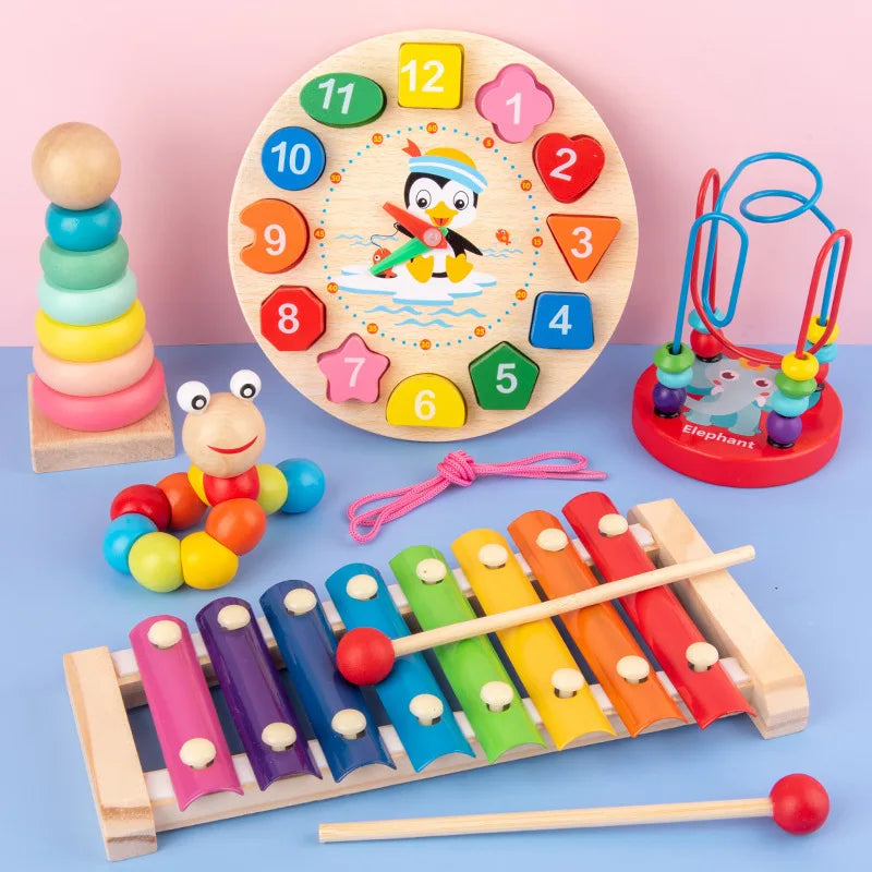 A set of wooden puzzles and stacking toys including a large circular puzzle, stacking rings, and wooden puzzles for toddlers.