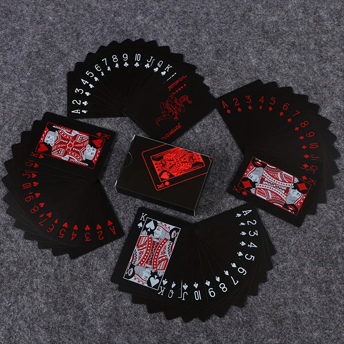 A set of waterproof PVC playing cards featuring a full deck and individual cards displayed on a gray surface.