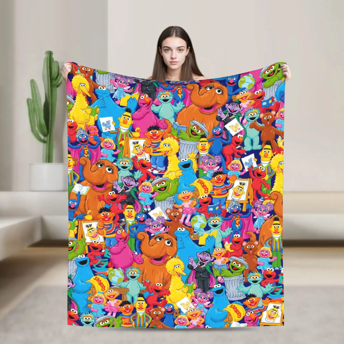 A colorful flannel throw blanket featuring characters from Sesame Street and Friends