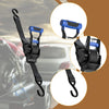 Close-up view of a black and blue retractable ratchet tie-down strap with an auto-retract mechanism.