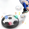 A close-up view of an LED hover soccer ball with glowing lights, demonstrating its use in a sports context.