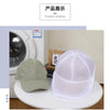 A white mesh laundry bag for hats and delicate clothing is displayed on a white surface.