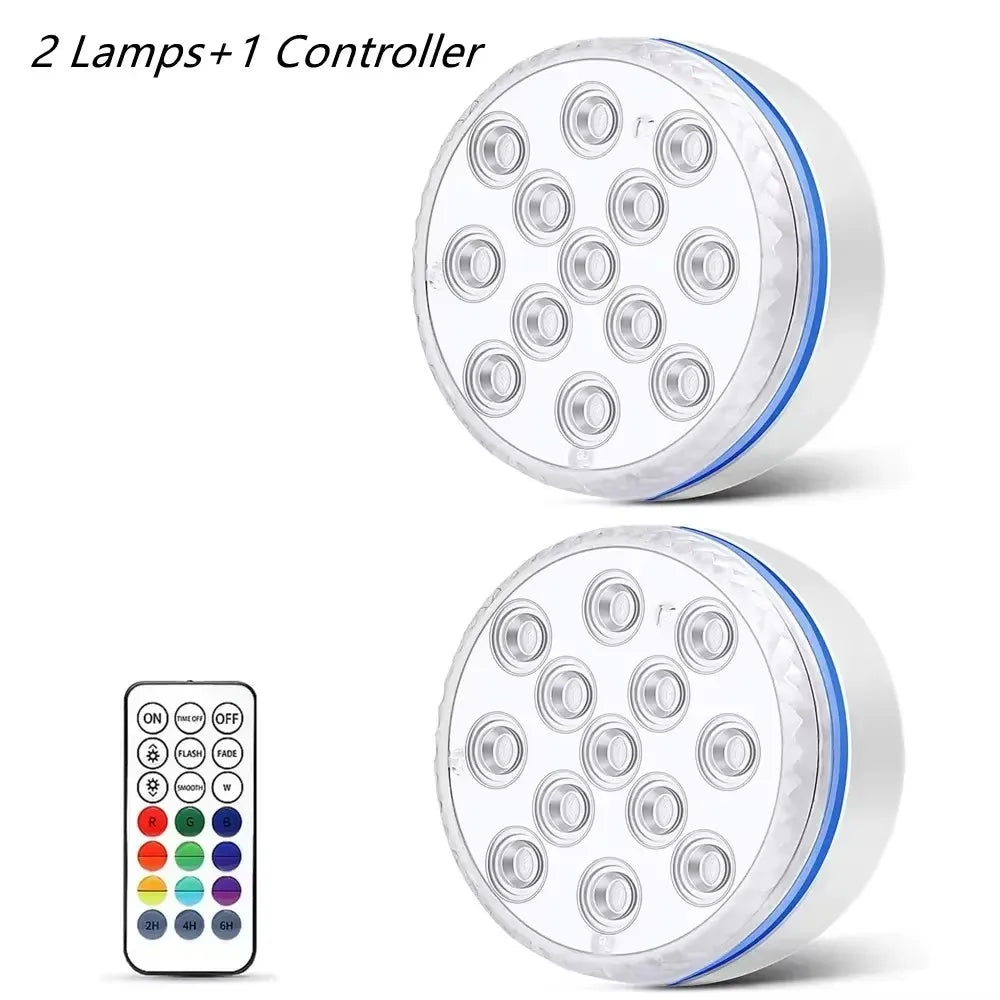 A round submersible LED pool light fixture with multiple lenses and a separate controller remote.
