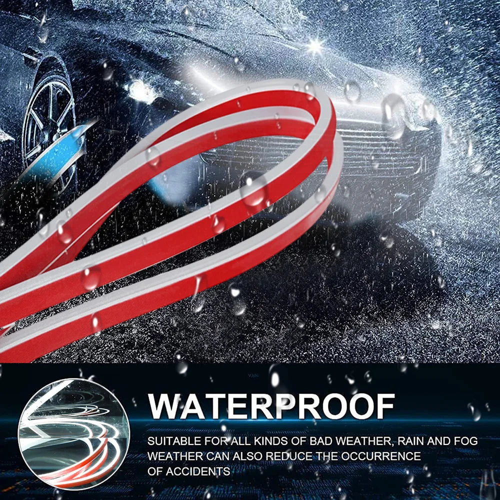 Red and white LED light strip wrapped around a car hood in rainy weather